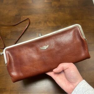 Consuela Tawny Clamshell Clutch Wallet in Brown Leather with Crossbody Strap